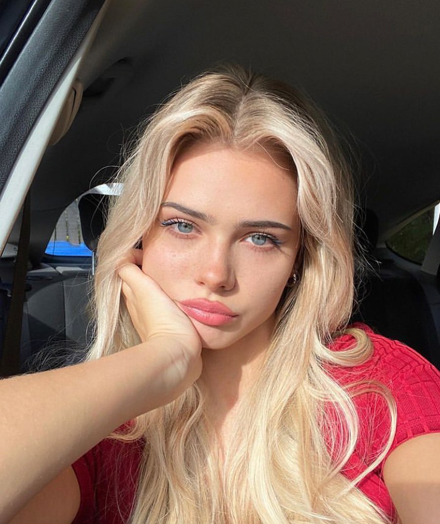 Beautiful Woman Wearing Topaz Blue Rarest Colored Contact Lenses